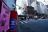 Pedestrians crossing on 57th Street, New York