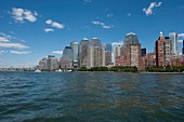 View of sea overlooking New York City skyline