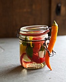 Close-up of chilli pickles in jar