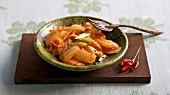 Kimchi with pickled cabbage in bowl