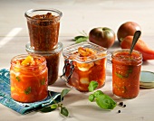 Four different homemade tomato sauces in air tight jars