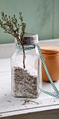 Homemade herb salt in glass jar