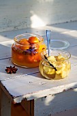 Homemade preserved kumquats and ginger roots in syrup