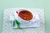 Beetroot dressing in sauce boat