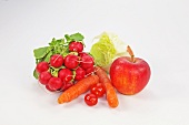 Various fruits and vegetables on white background