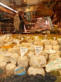 Various cheese with price tags in shop, Ile Saint-Louis, Paris, France