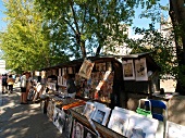 People buying paintings on street in Paris, France