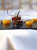 Majorcan almond cake with pickled apricots on almond ice