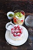 A strawberry trifle with rhubarb, and a fig trifle with raspberries