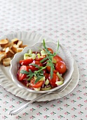Colourful tomatoes salad in bowl