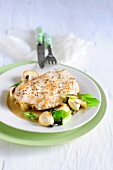 Close-up of turkey escalope with mushroom ragout, low GI diet food