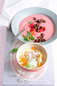 Fruit salad with coconut sabayon and rhubarb buttermilk in bowls, low GI diet food