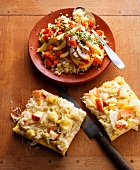 Couscous with vegetables and cabbage salad on pancakes