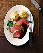 Roasted beef with chocolate on plate