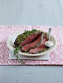 Herb roast beef with remoulade on plate