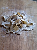 Mushroom pasta on wooden board