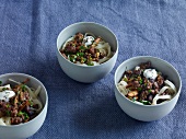 Parsley and minced meat with yogurt in three bowls