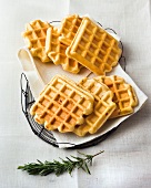 Yeast waffles and herbs waffles on paper napkin
