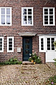 Entrance of house with windows