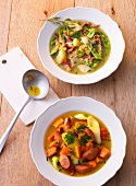 Pear beans and bacon stew with pumpkin and leek stew in bowl