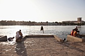 People diving in Nile river, Aswan, Egypt