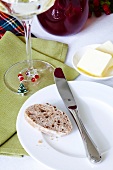 Wine glass with Christmas tree motif ring on table cloth