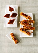 Caramel and coconut bars on plates