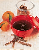 Mandarin and licorice tea in bowl
