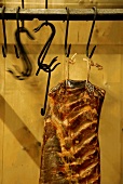 Meat hung in butcher's gallery at France