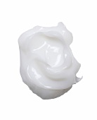 Blob of hair pack cream on white background