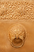 Close-up of entrance door handle in Punakha Dzong, Bhutan