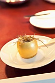 Golden egg in salt bed on plate at Star restaurant, Erfort