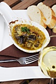 Grafschafter snails with vegetable and herb butter in pan