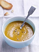 Cream of pumpkin soup in bowl