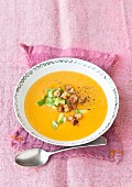Sweet potato soup with avocado and croutons