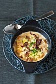 Gratinated bread soup with porcini mushrooms