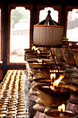 Burning butter lamps in Memorial Chorten in Thimphu, Bhutan