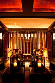 Interior view of illuminated lobby in Uma Paro hotel, Bhutan