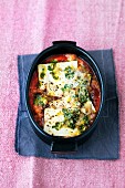 Tofu with herbs and lemon zest in tomato sauce
