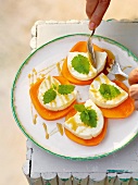 Four pieces of sweet caprese on plate