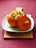 Pumpkin with millet filling on plate