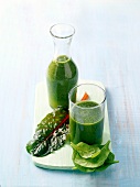Green smoothie for sound sleep in flask and glass