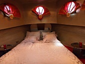 Interior of Bedroom in houseboat on Prinsengracht canal in Amsterdam, Netherlands