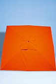 Orange wooden frame sun umbrella