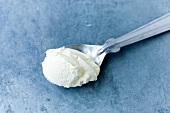 Close-up of mascarpone on spoon