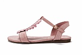 Close-up of pink leather sandal with strap on white background