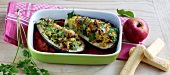 Stuffed eggplant with tomato in serving bowl