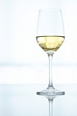 Close-up of wine glass with white wine
