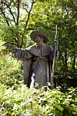 Statue of St. Jacob between tree in Wasserburg am Inn, Bavaria, Germany