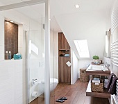 Interior of bathroom with vanity sink and toilet seat